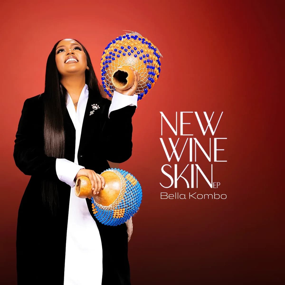 New Wine Skin EP cover — Bella Kombo holding beaded gourds against a red background