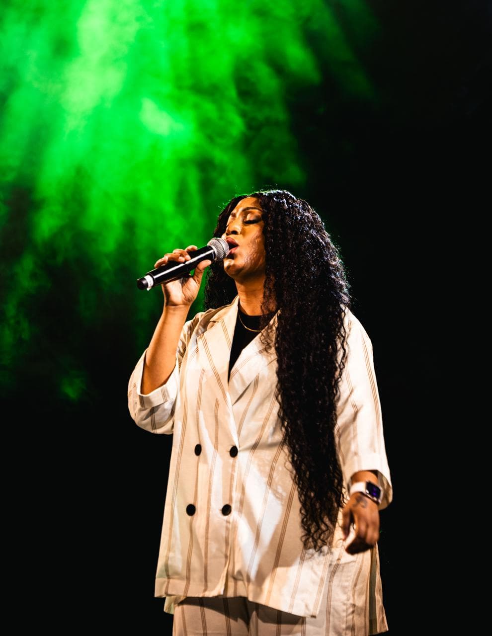 Bella Kombo performing at In Christ Now, Camp Kigali, on 25 July 2026